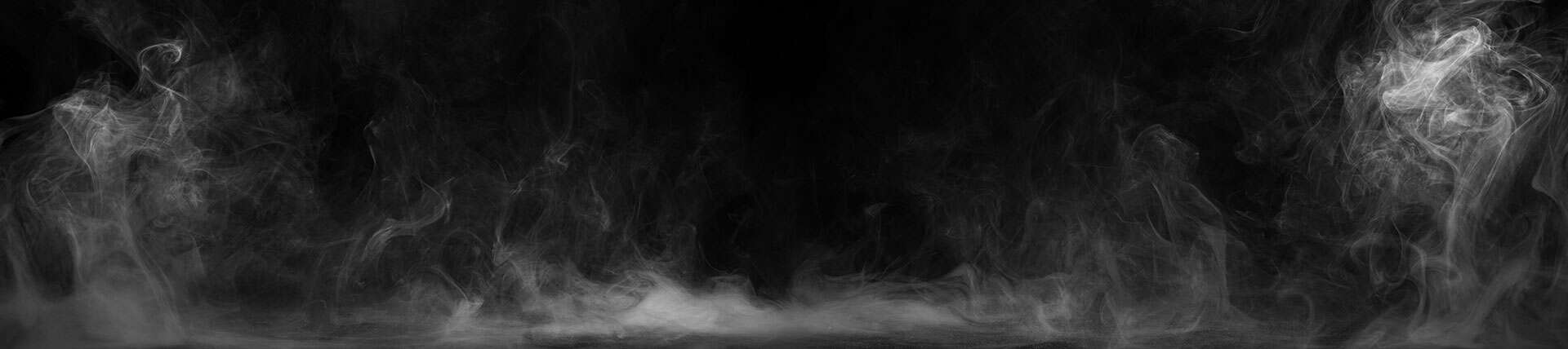 Panoramic view of the abstract fog. White cloudiness, mist or smog moves on black background.